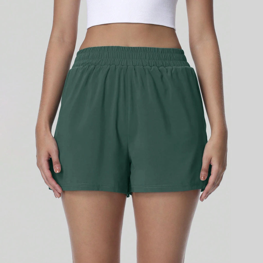 Women's Breathable Moisture-Wicking Underwear Lining Split Hem Sports Shorts With Pockets High Elastic Waist Workout Shorts