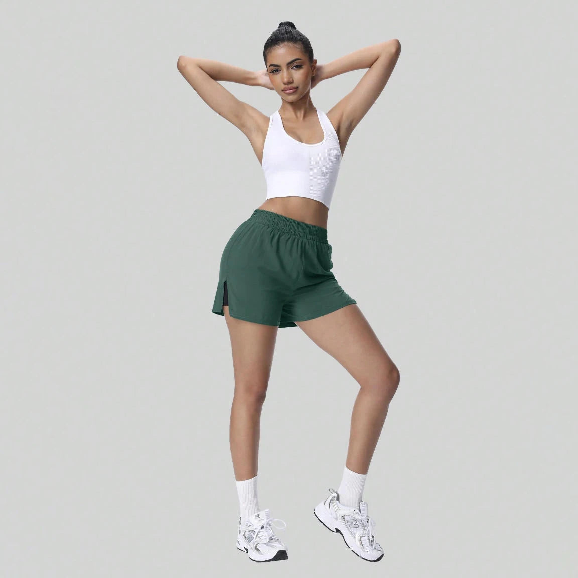 Women's Breathable Moisture-Wicking Underwear Lining Split Hem Sports Shorts With Pockets High Elastic Waist Workout Shorts